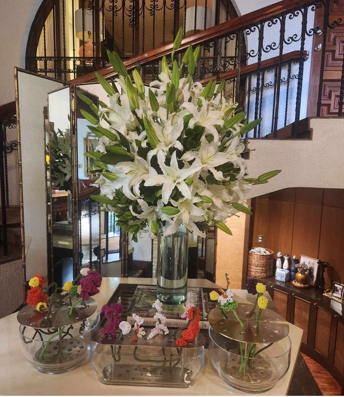 30  Casablanca Lilies in a tall vase